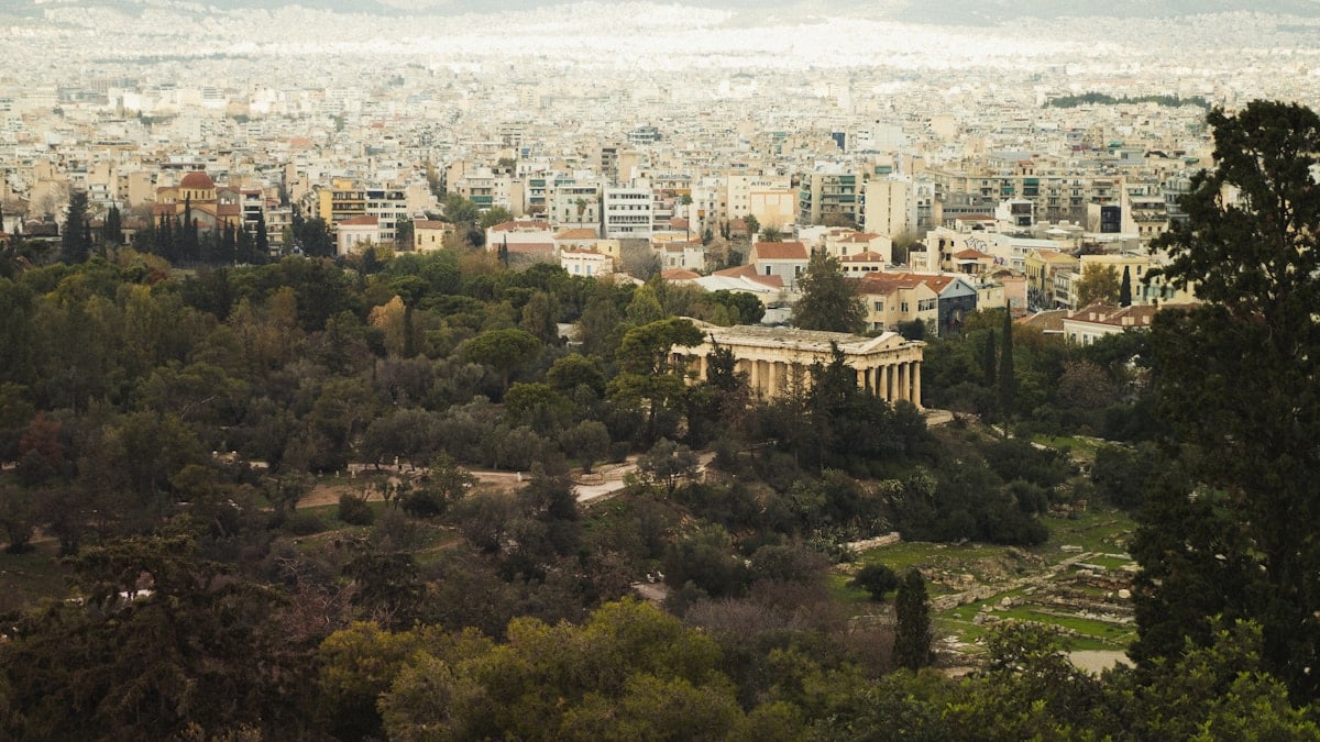 Ancient ruins on a hill overlooking a city